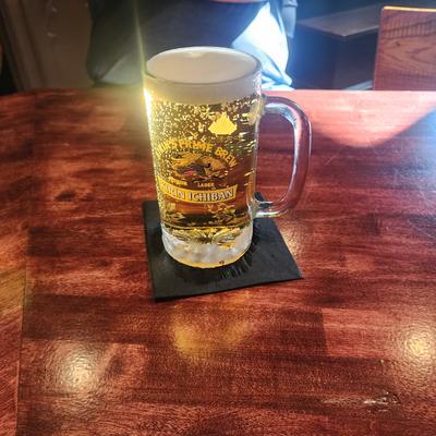 Frosty mug of Kirin Ichiban draft beer on the bar