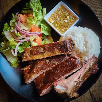 Korean BBQ St. Louis ribs with rice, salad and a spicy dipping sauce